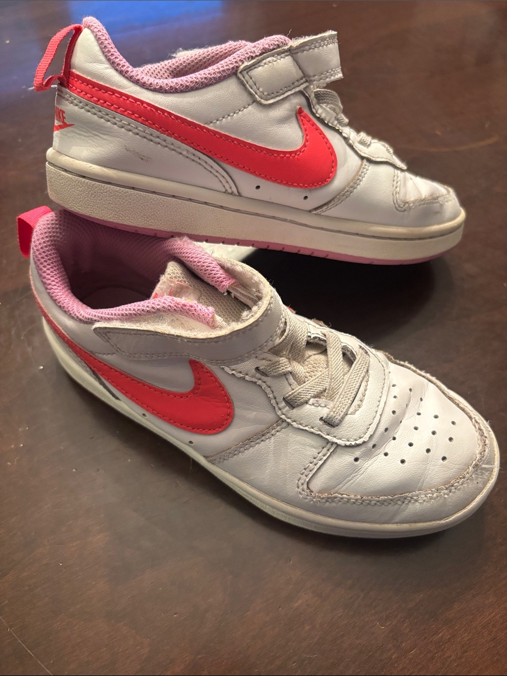 Nike Kids White Sneakers with Pink Swoosh and Pink Lining